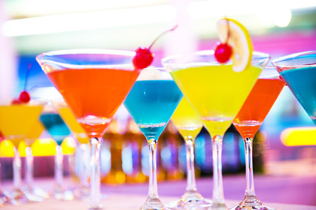 Group of colorful cocktail in martini glasses.の写真素材