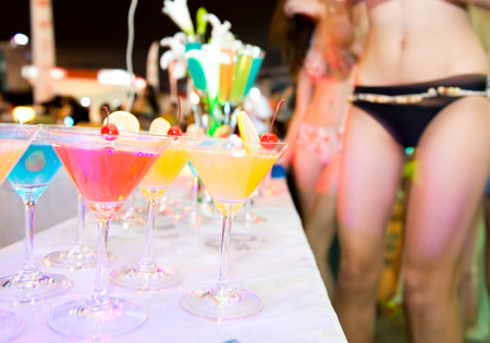 Group of colorful cocktail in martini glasses.の写真素材