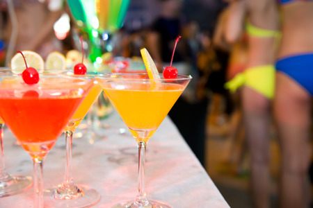 Group of colorful cocktail in martini glasses.の写真素材