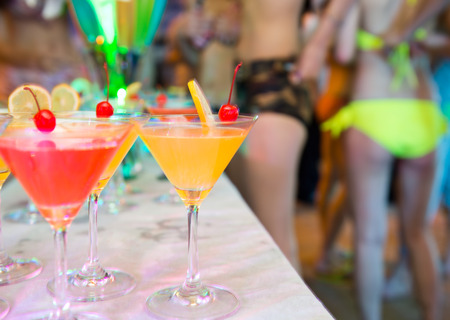 Group of colorful cocktail in martini glasses.の写真素材