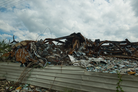 old ruined buildings of metal warehouse.の写真素材
