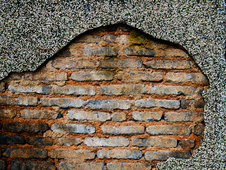 cracked concrete old brick wall background.の写真素材