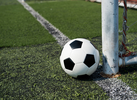 soccer ball on stadium grass line.の写真素材