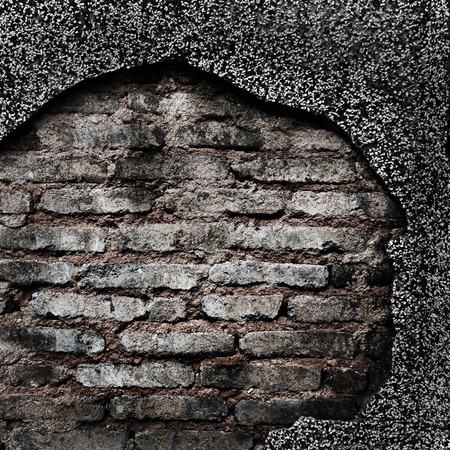 cracked concrete old brick wall background.の写真素材