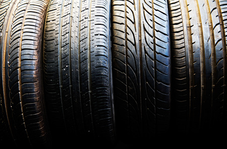 Group of old tires at a tire store.の写真素材