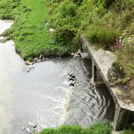Water pollution in river with trash.の写真素材