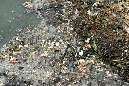 Water pollution in river with trash.の写真素材