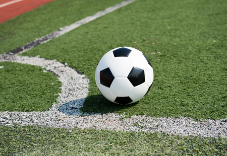 soccer ball on stadium grass line.の写真素材