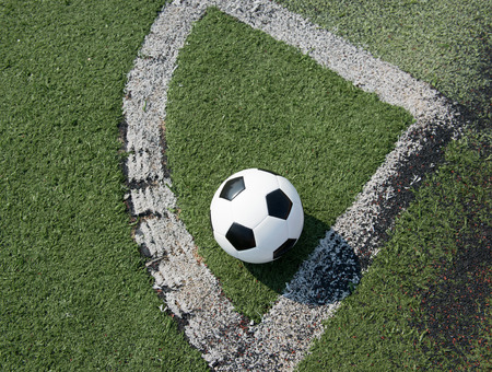 soccer ball on stadium grass line.の写真素材