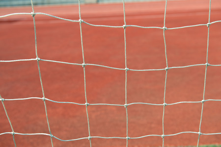 Closeup of white soccer goal net.の写真素材