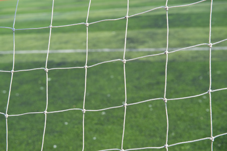 Closeup of white soccer goal net.の写真素材
