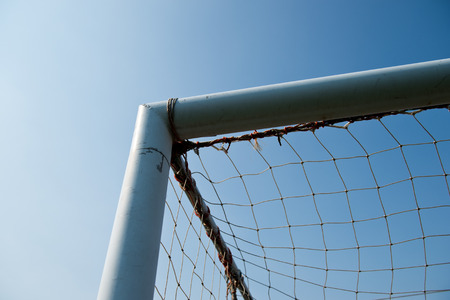 soccer goal against blue sky background.の写真素材