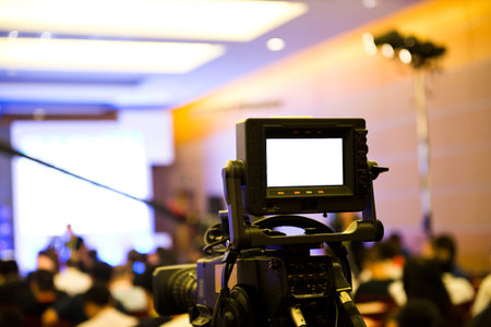 Live broadcasting, television operator with camera.