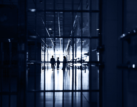 People walking through the hospital corridor.の写真素材