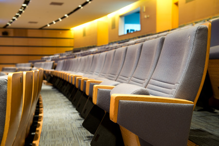 Empty rows of chairs in theater.のeditorial素材