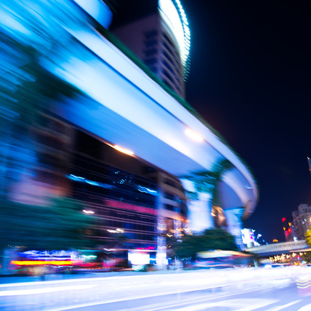 Abstract traffic lights in motion blur at night.の写真素材