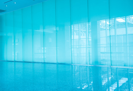 modern interior with glass wall in an office building.の写真素材