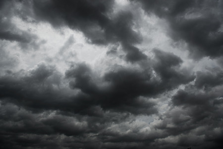 Background of dark clouds before a thunder-storm.の写真素材