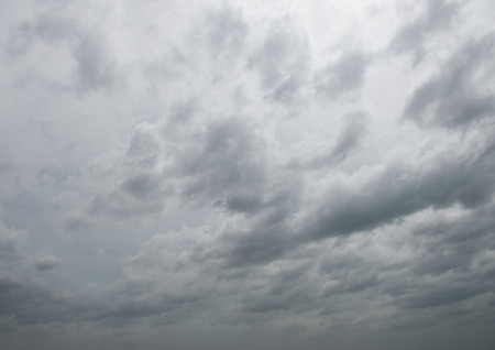 Background of dark clouds before a thunder-storm.の写真素材