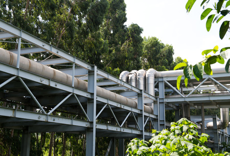 Steel pipelines in a industrial zone.の写真素材