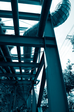 Steel pipelines in a industrial zone.の写真素材