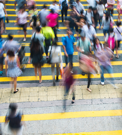 Busy city people on zebra crossing street in Hong Kong, China.のeditorial素材