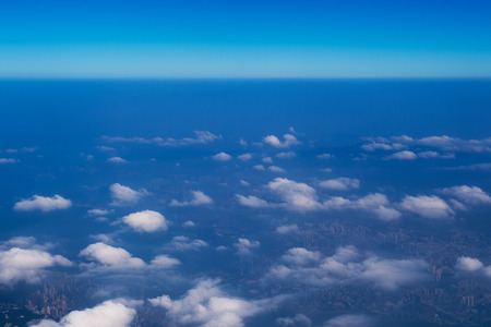 hong kong skyline, view from a flying airplane.の写真素材