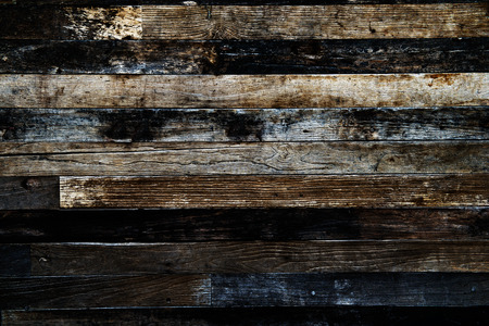 old, grunge wood panels used as backgroundの写真素材
