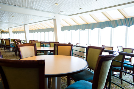 Empty tables at a luxury cruise restaurantのeditorial素材