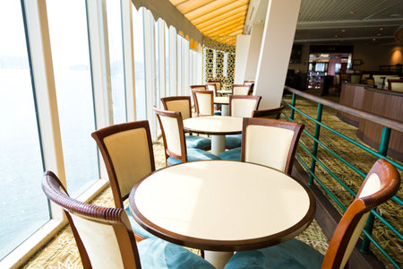 Empty tables at a luxury cruise restaurantのeditorial素材