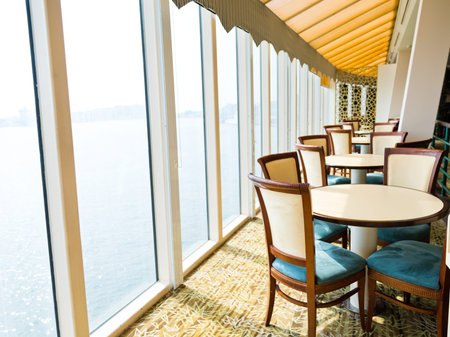 Empty tables at a luxury cruise restaurantのeditorial素材