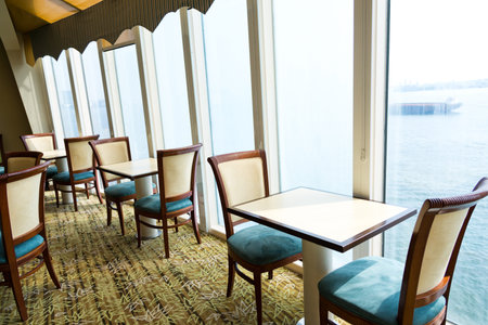 Empty tables at a luxury cruise restaurantのeditorial素材