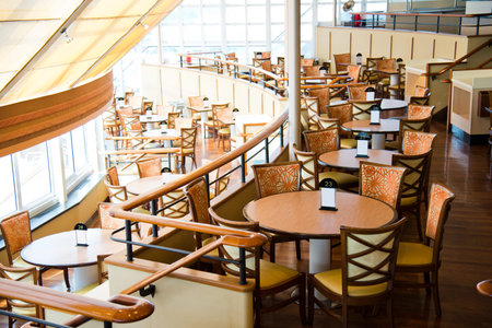 Empty tables at a luxury cruise restaurantのeditorial素材