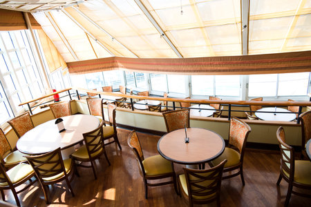 Empty tables at a luxury cruise restaurantのeditorial素材