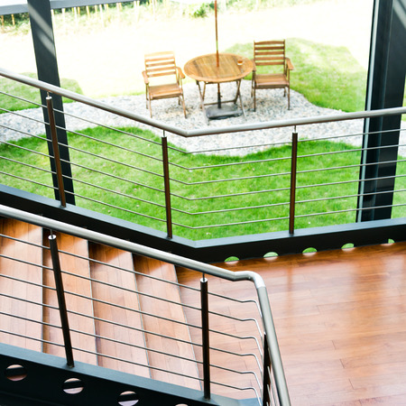 Empty office stairs with handrail in a modern building.の写真素材