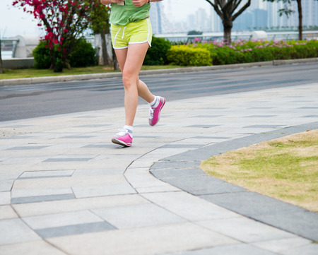 Low section of a running woman.の写真素材