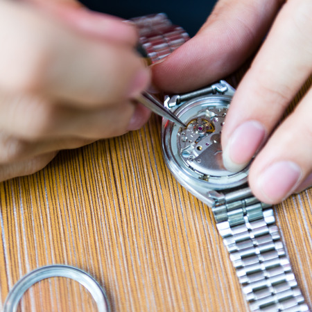 Watch repair in the workshop.の写真素材