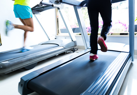 People running on a treadmillの写真素材