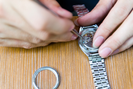 Watch repair in the workshop.の写真素材
