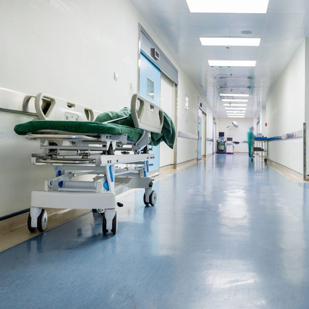 Doctors and nurses walking in hospital hallway, blurred motion.のeditorial素材