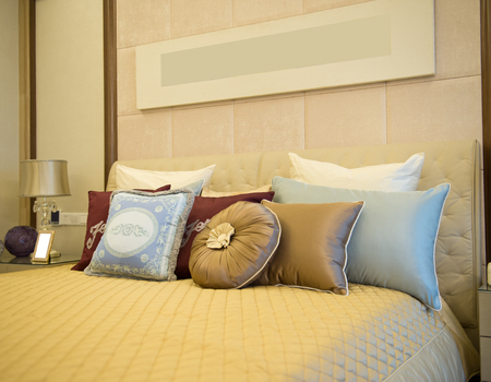 Image of comfortable pillows and bed.のeditorial素材