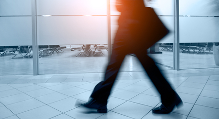 Walking business people silhouette. Blue tint.の写真素材