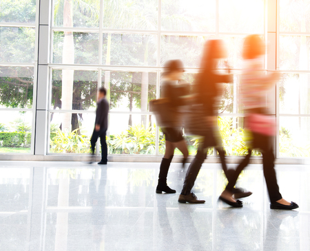 Business people rushing in the lobby. motion blurのeditorial素材