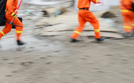 Search and rescue forces search through a destroyed building. blur motionの写真素材