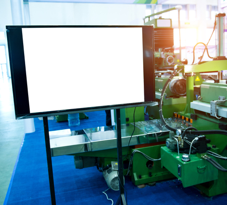 Industrial machine control room with computer monitors.の写真素材