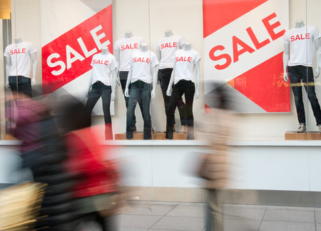 window display with text SALE in a shop.