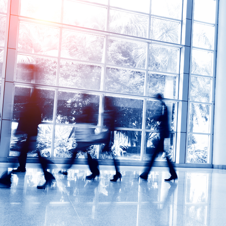 Business people rushing in the lobby. motion blurのeditorial素材