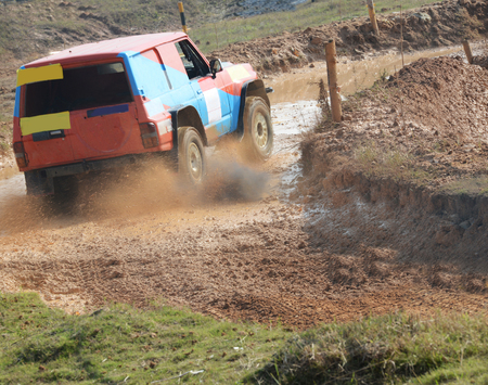 Driver competing in an off-road 4x4 competition.の写真素材