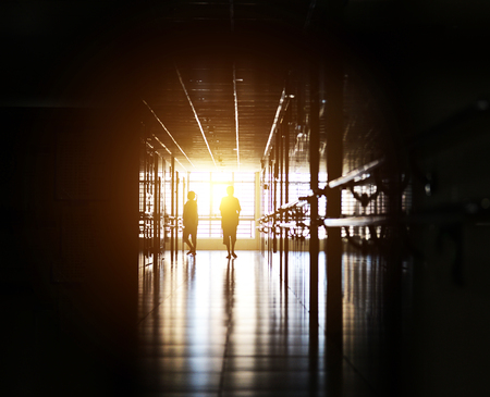 People walking through the hospital corridor.の写真素材