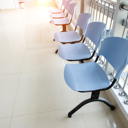 Chairs in the hospital hallway. hospital interiorの写真素材